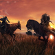 Two Elden Ring warriors fight on horseback in front of the sunset.